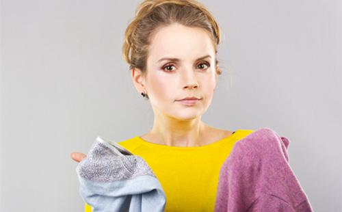 Girl holds underwear in hands