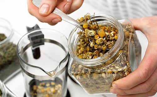 Dry chamomile in a jar
