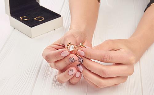 Girl holds rings in her hands