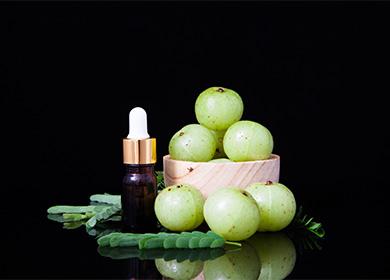 Amla oil and fruits