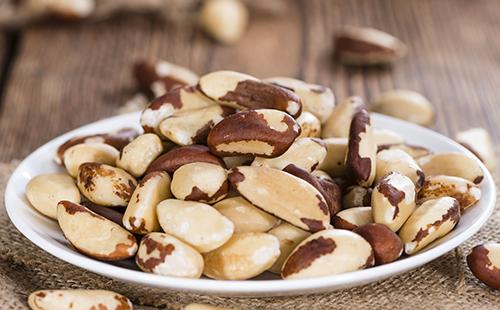 A bunch of nuts in a plate