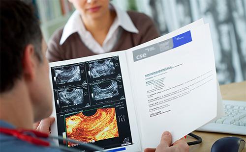 Doctor examines a snapshot