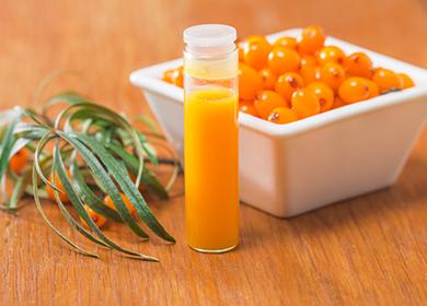 A bubble of orange oil next to the berries