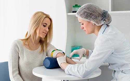 Woman takes a blood test