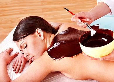 Beautician applies chocolate