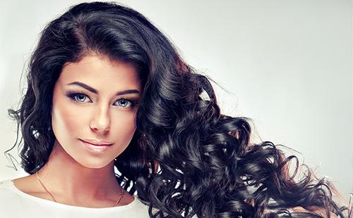 Beautiful brunette with curly hair