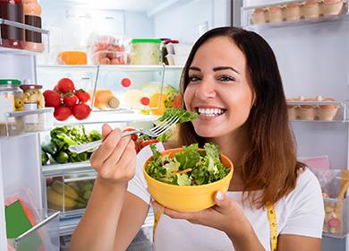 Girl eating salad