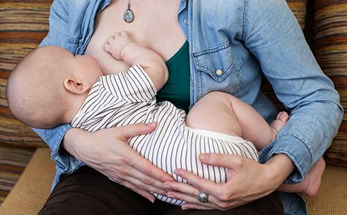 Woman breastfeeding a baby