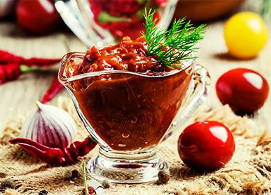 Adjika from plums in a gravy boat