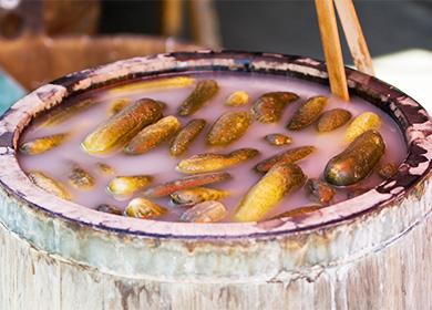 Pickled cucumbers in a barrel