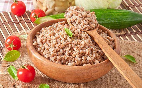 Buckwheat porridge in a wooden bowl