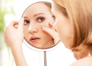 Woman looking in the mirror