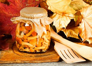 Pickled honey mushrooms in a jar