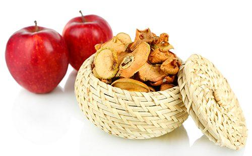 Dried apples in a wicker basket