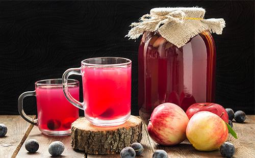 Apple compote with a cup and a jar