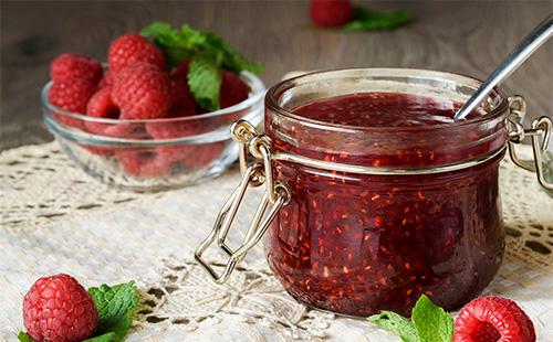 Beautiful jar with raspberry jam