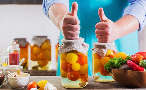 Jars with colorful tomatoes