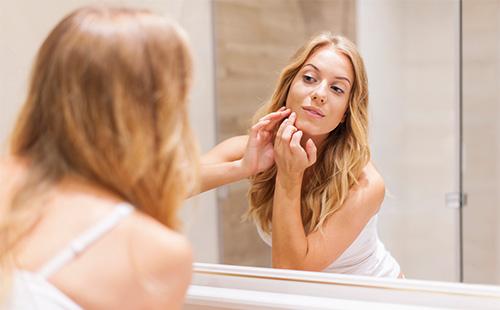 Girl looks at her chin