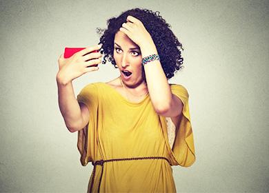 Astonished woman in yellow dress