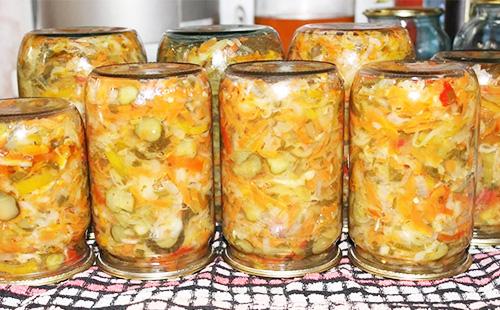 Salad of different vegetables in jars