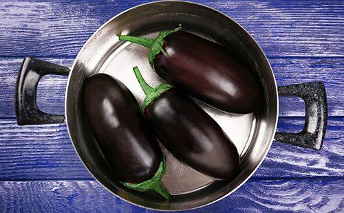 Three eggplants in a saucepan