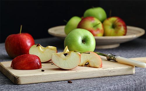 Apple slices on a blackboard