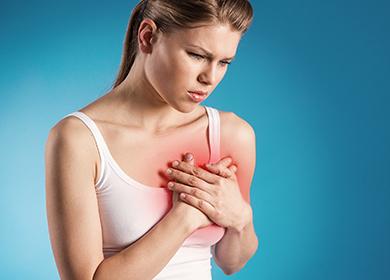 Girl holding her chest