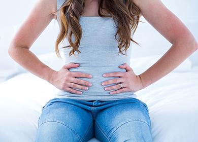 The girl is worried about her stomach