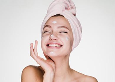 Girl smears face cream