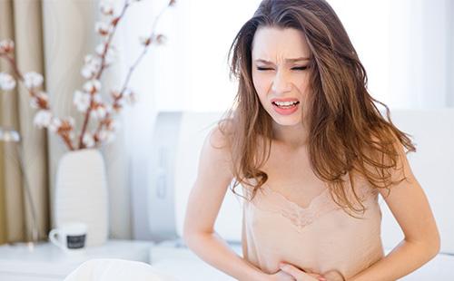 The girl has a stomach ache