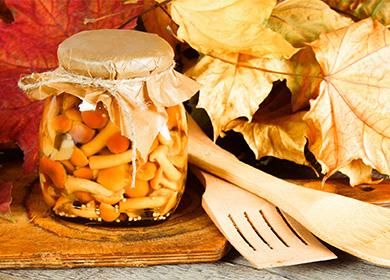 Pickled honey mushrooms in a jar