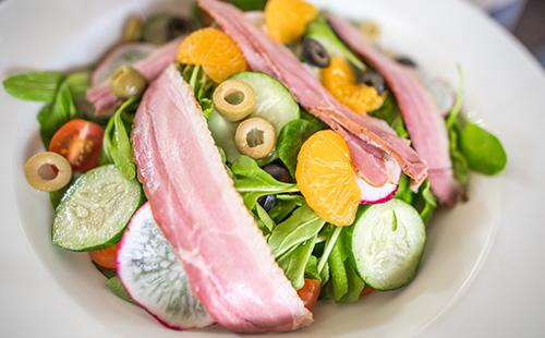 Salad with smoked meat and vegetables