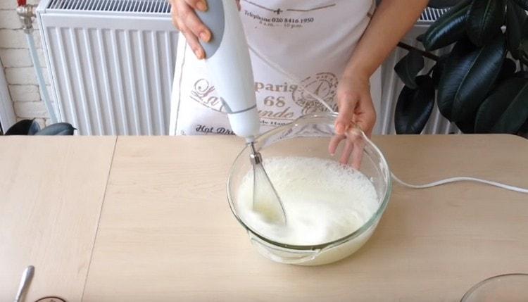 Beat the whites in a light foam.