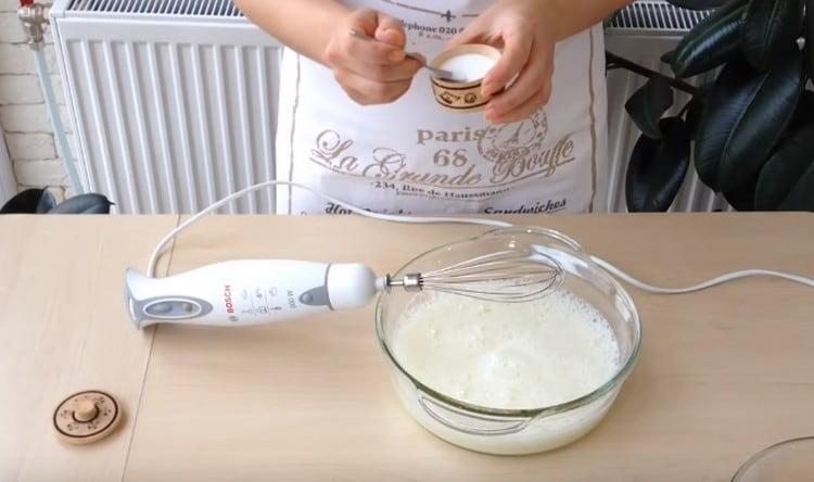 Add a pinch of salt to the proteins and whisk a little more.