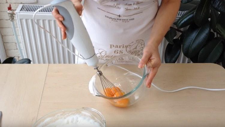 Separately, beat the yolks.
