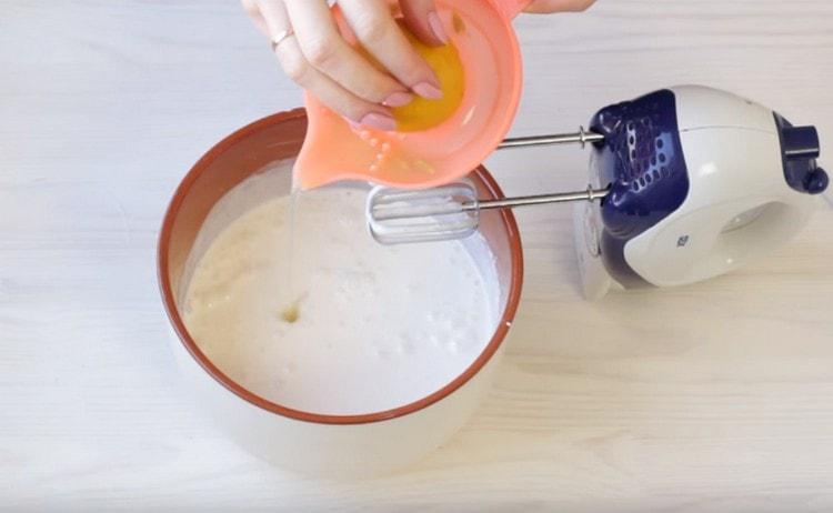 Add lemon juice to sour cream and whisk more.