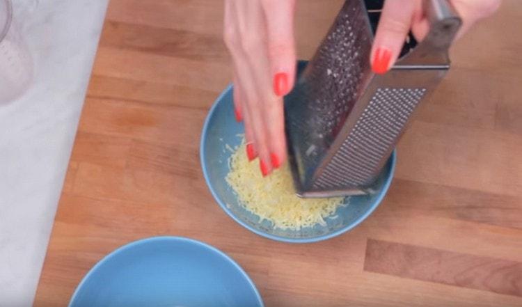 The filling for pancakes with ham and cheese is prepared as easy as shelling pears.