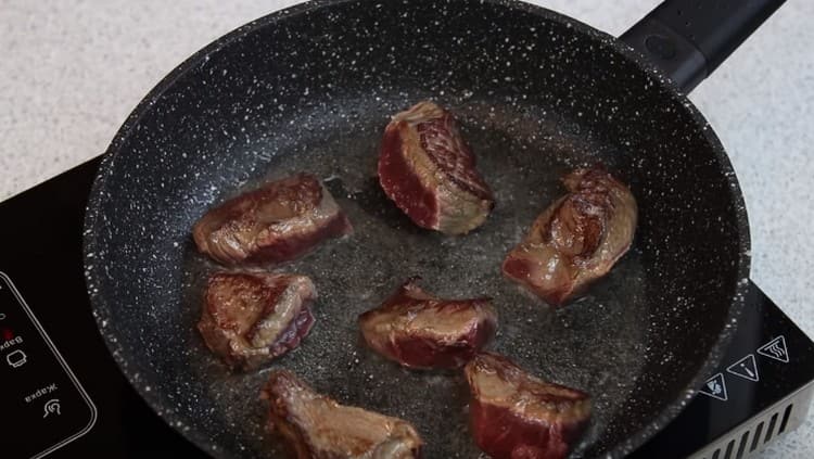 First, the meat must be fried in a pan until golden brown.