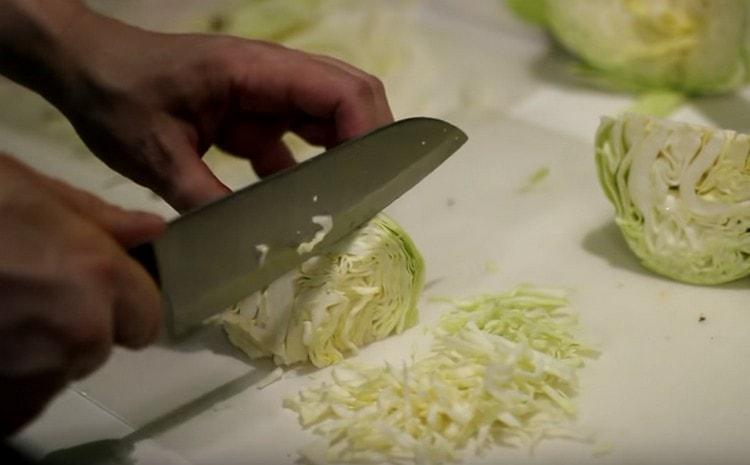Finely chop the cabbage.