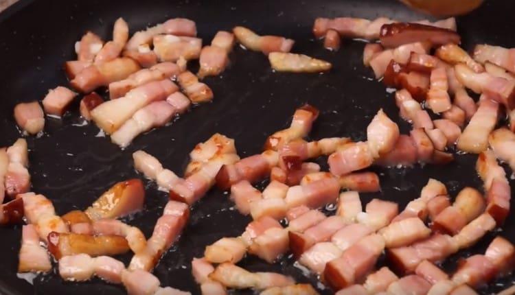 Fry the loin until golden brown.
