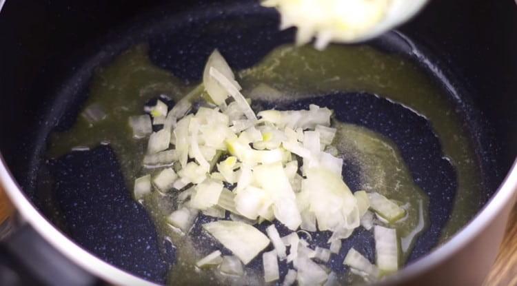 put the onion and fry it until transparent.