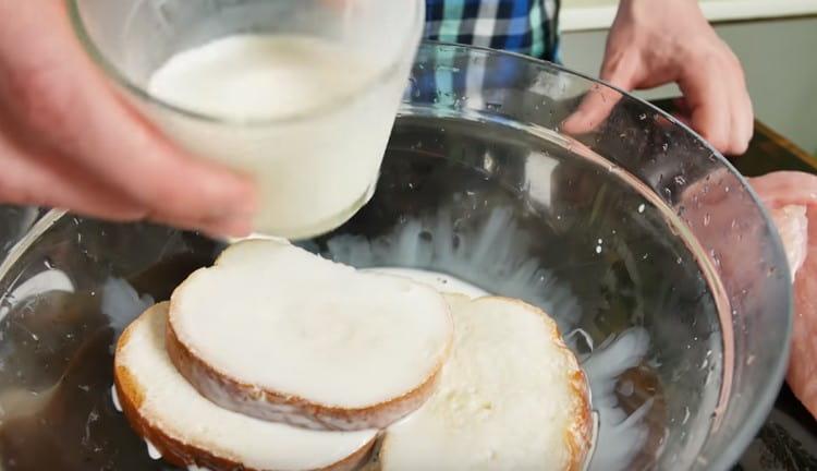 Soak slices of loaf in milk.