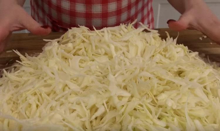 First, chop the cabbage finely.