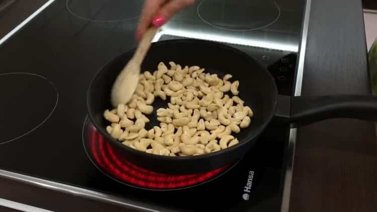 To make Kiev cake at home: fry nuts