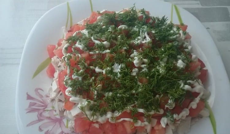 Next, sprinkle the dish with chopped dill.