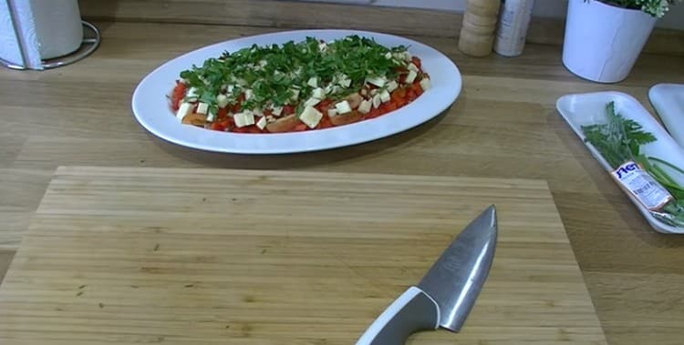Decorate the salad with finely chopped herbs.