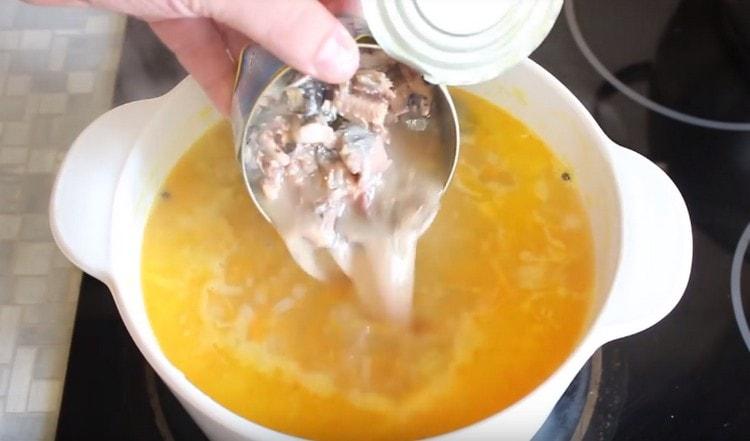 We transfer our canned goods to soup.