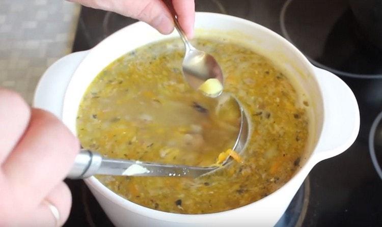 Cook the dish until the potatoes are ready.