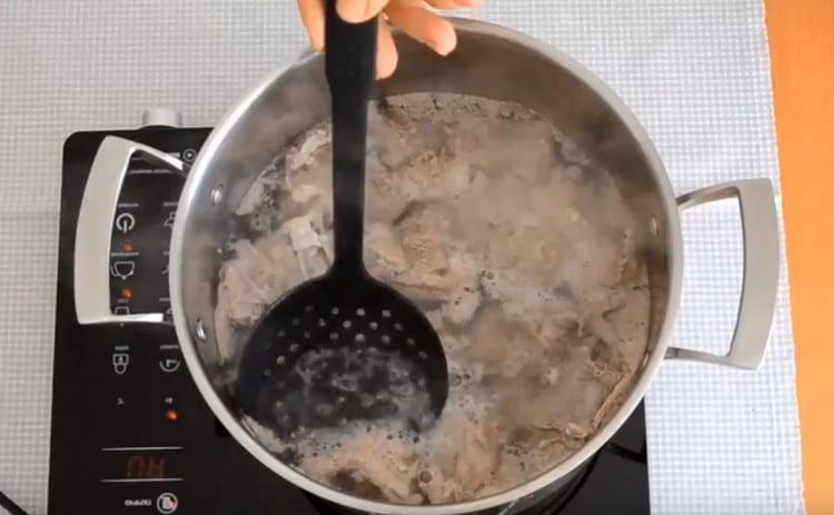 Cook the meat. removing foam if necessary.