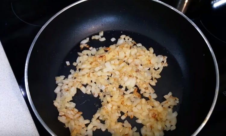 Fry the onion until golden.